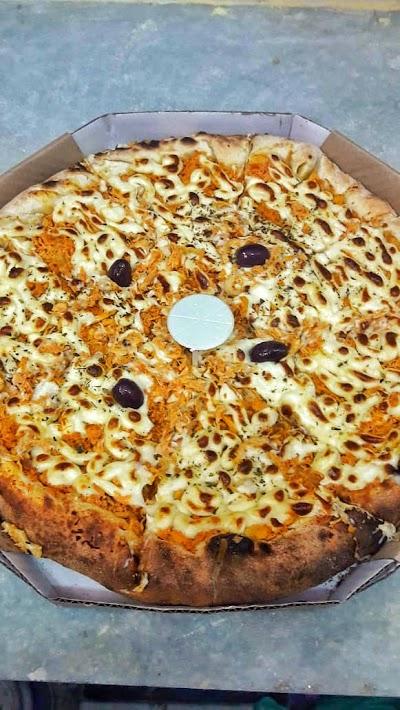 Disk Pizza Portuga's - Foto 1